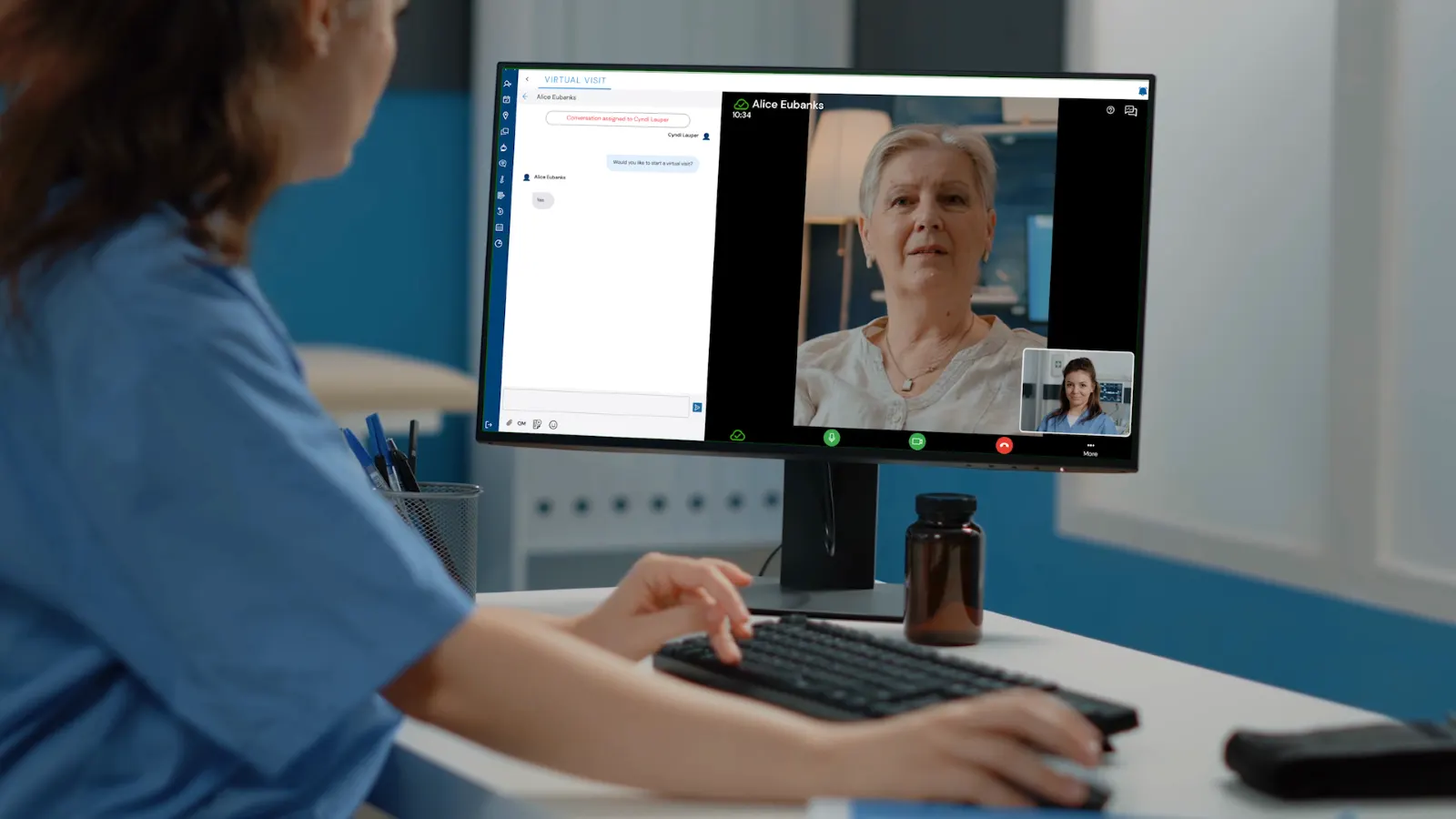 A female nurse is talking to a female patient during a virtual visit.