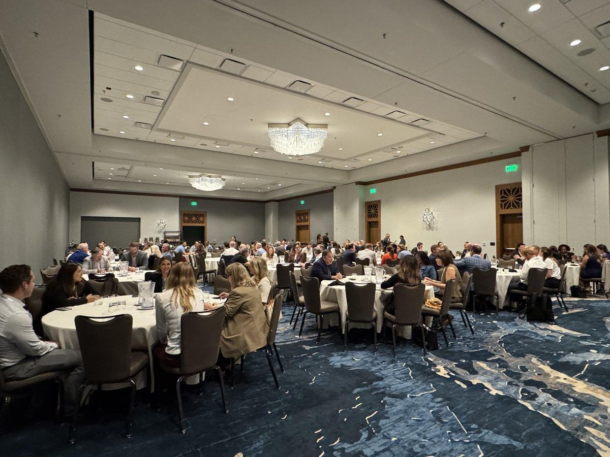Attendees networking over lunch at round tables during the HHCN and HMEB FUTURE Conference 2026 at the JW Marriott Austin